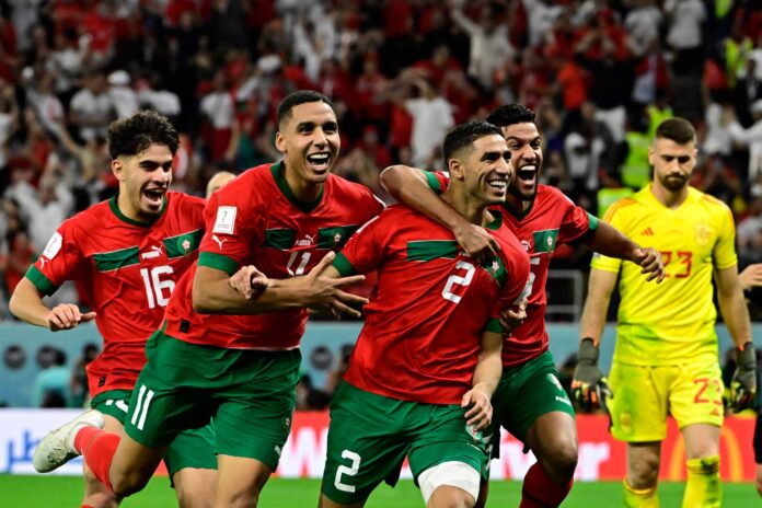 TOPSHOT-FBL-WC-2022-MATCH55-MAR-ESP