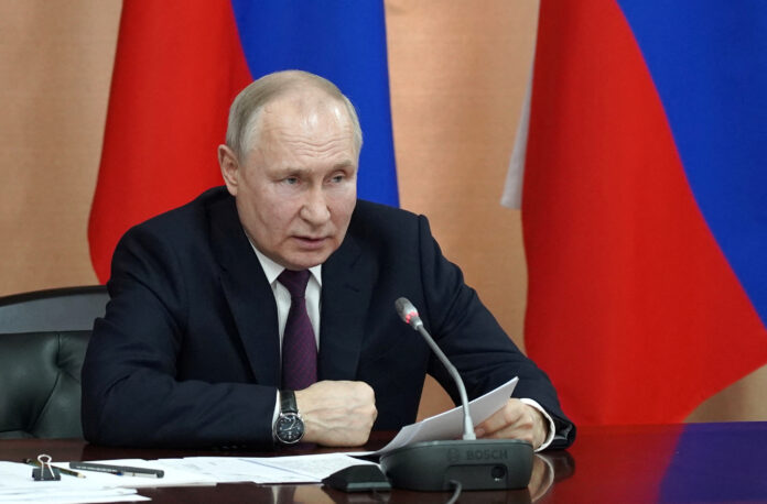 FILE PHOTO: Russian President Vladimir Putin chairs a meeting in Pyatigorsk